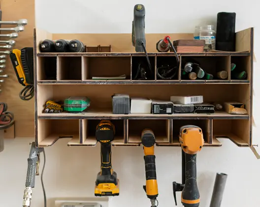 Garage storage shelving holding tools, equipment and sports gear