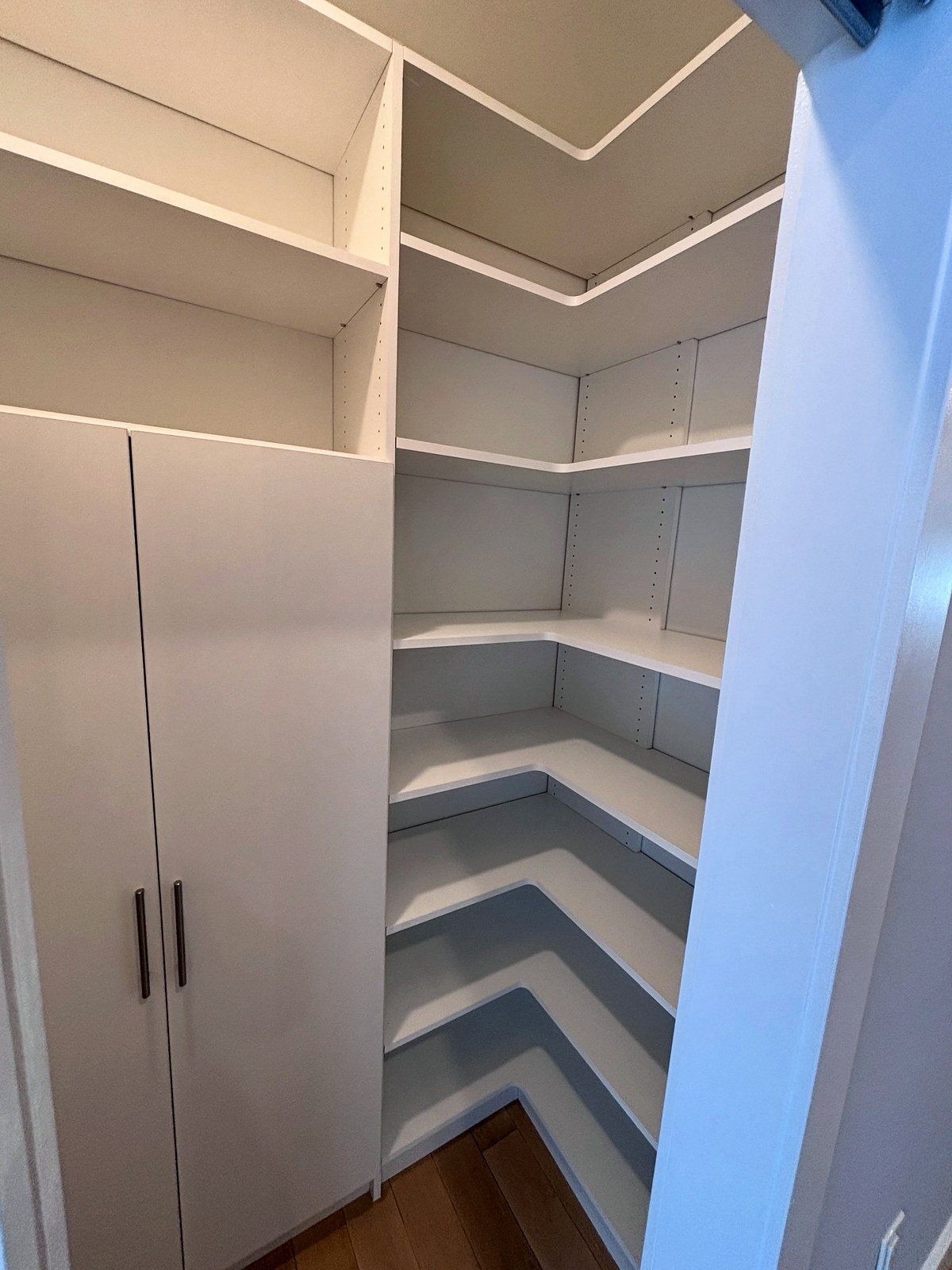 Custom corner pantry with full-height adjustable shelving in a New Jersey kitchen