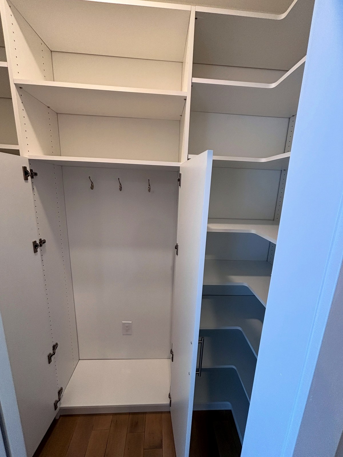 Mudroom built-in with coat hooks, cubbies and bench
